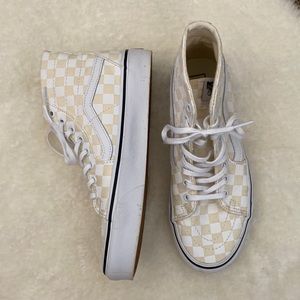 Hi-top cream and white checkered Vans